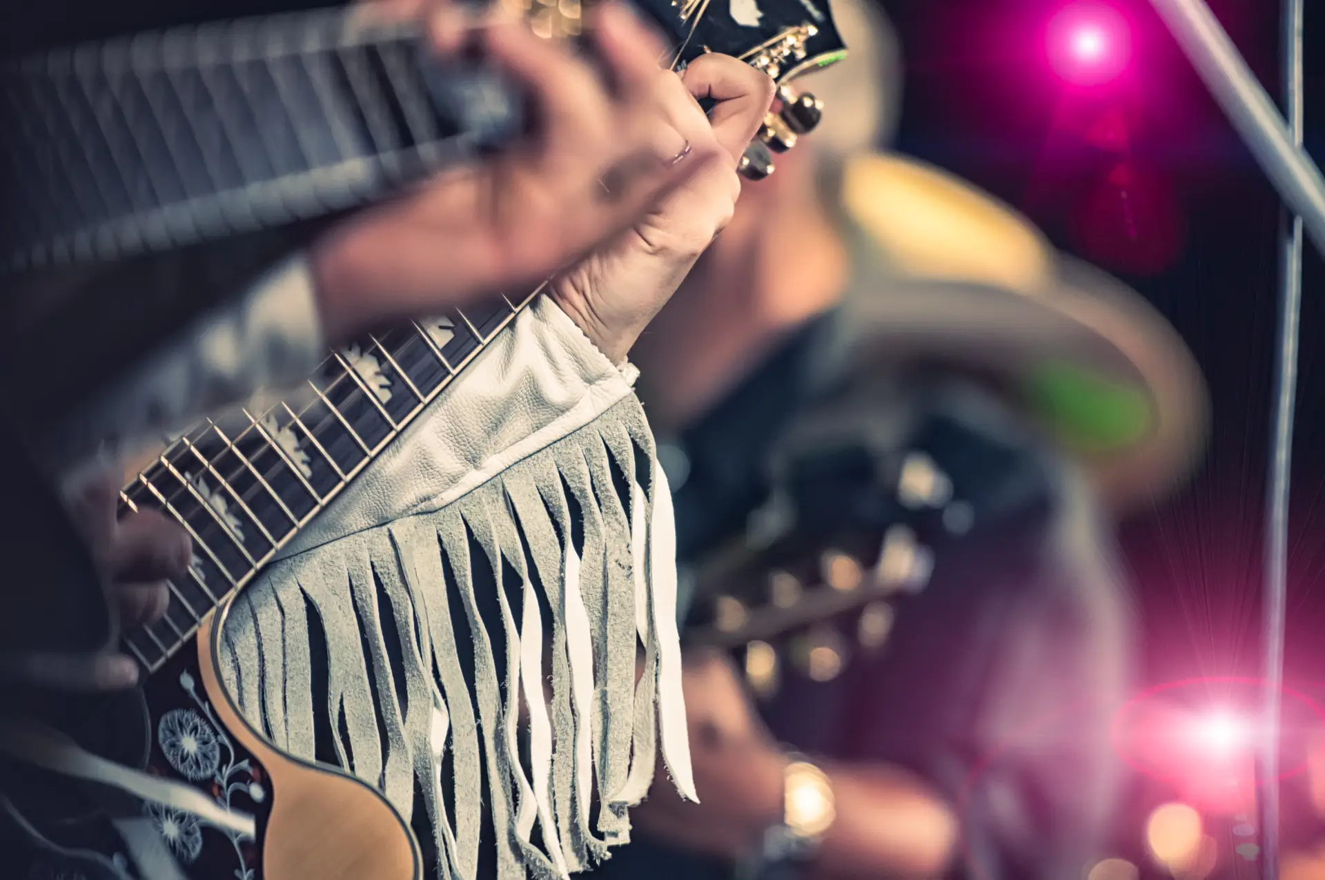 Playing guitar in a retro concert