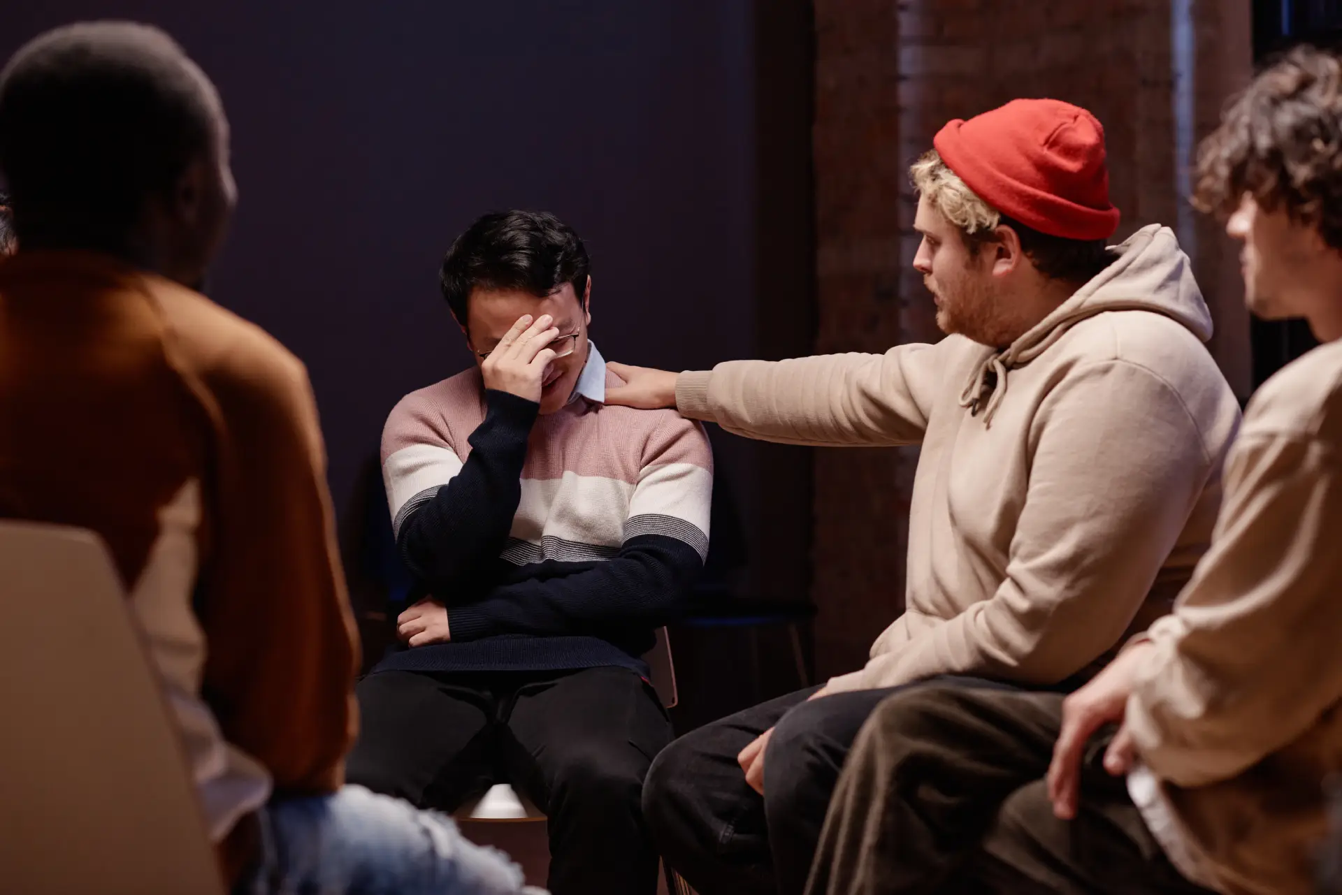 Man receives support in a group setting
